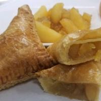 Apple Turnover · Enjoy our delicious homemade Apple Turnovers made with layers of flaky puff pastry, sliced a...