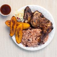 Jerk Chicken Combo (Spicy) · Spicy leg quarters with rice and peas cooked with coconut milk, house salad, and plantains.