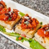 Bruschetta · Fresh diced tomatoes with garlic, extra virgin olive oil & basil served over toasted Italian...