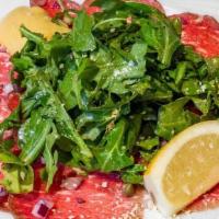 Carpaccio Di Manzo · Thinly sliced beef fillet marinated with extra virgin olive oil