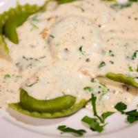 Ravioli Alla Crema Dl Noci · Homemade pasta, stuffed with spinach and ricotta cheese, served in a walnut cream sauce
