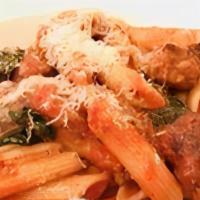 Penne Con Salsiccia · Tube pasta with sausage, tomatoes, spinach, marinara sauce.