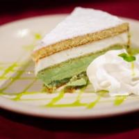 Ricotta Pistachio Cake · Ricotta and pistachio creams separated by sponge cake,. decorated with crushed pistachios. a...