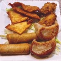Combination Appetizer · 2 Pc of egg roll, 2 Pc of pot stickers, 2 Pc of fried shrimps 2 Pc of crab cheese wonton and...
