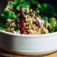 Larb Gai · Spicy. Thai herbal minced chicken salad with spicy lime dressing, toasted rice, roasted chil...