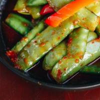 Spicy Snow Peas · Stir-fried snow peas in red curry sauce