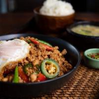 Pad Gra Pow · Stir fried Thai basil, fresh chili, bell peppers, onions, garlic, and your choice of meat. S...