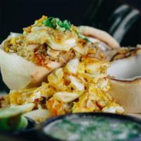 Crab Fried Rice · Fried rice with crab, green onions, white onions and double eggs served in young coconut wit...