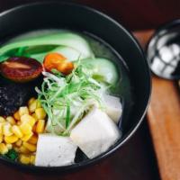 Niwa · Vegan ramen with kale noodles in vegetable broth topped with tofu, kikurage mushrooms, baby ...