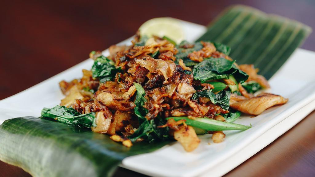 Pad See You · Chargrilled stir-fried flat rice noodles with eggs, Asian broccoli, and your choice of protein.