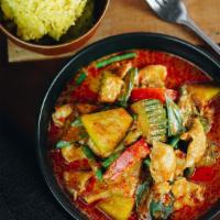 Kabocha Curry · Rich kabocha squash red curry with your choice of protein, crispy yam, bell peppers, basil, ...