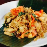 Pad Kee Mow · Spicy. Spicy flat rice noodles stir-fried with fresh chili, peppercorn, basil, snow peas, be...