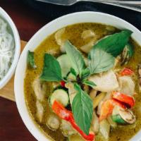 Green Curry · Creamy coconut green curry with your choice of protein, basil, snow peas, zucchinis, Thai eg...