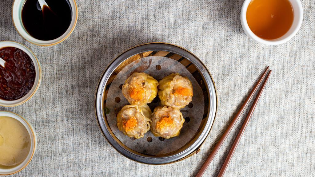 Pork Dumpling Shumai  燒賣 · Pork wrapped in an open dumpling skin and steamed to perfection.