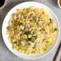 Chicken Fried Rice 雞炒飯 · Chicken and veggies are stir-fried and cooked with rice.