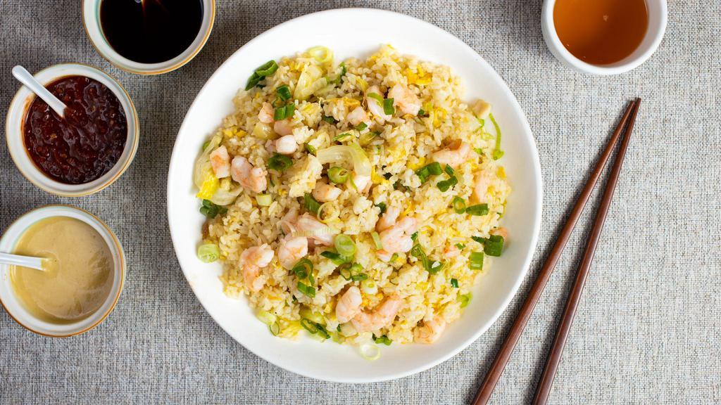 Shrimp Fried Rice 蝦炒飯 · Fresh shrimp and veggies stir-fried and cooked with rice.