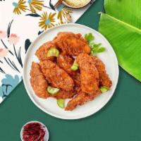 Crispy Chicken Wings · (6 pieces) Fresh chicken wings breaded and fried until golden brown.