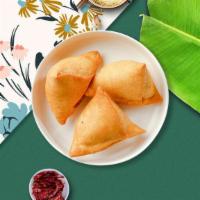 Just Thai Samosa · (8 pieces) Idaho potatoes mixed in a curry marinate & fried in a crispy wheat layer.