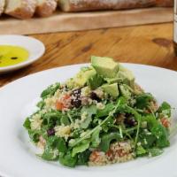 Insalata Regina · Wild arugula salad with couscous, avocado, tomatoes, red onions, capers, raisins, lemon & ex...
