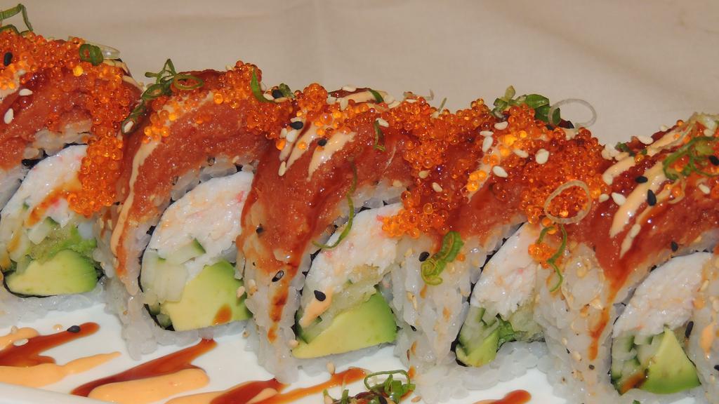 Red Dragon · In: Shrimp tempura, avocado, cucumber, crab / Out: Spicy tuna, tobiko, scallions