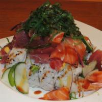 Poki Bowl Roll · In: Shrimp tempura, crab, avocado / Out: Assorted fish, red onion, cucumber, jalapeno, corn,...