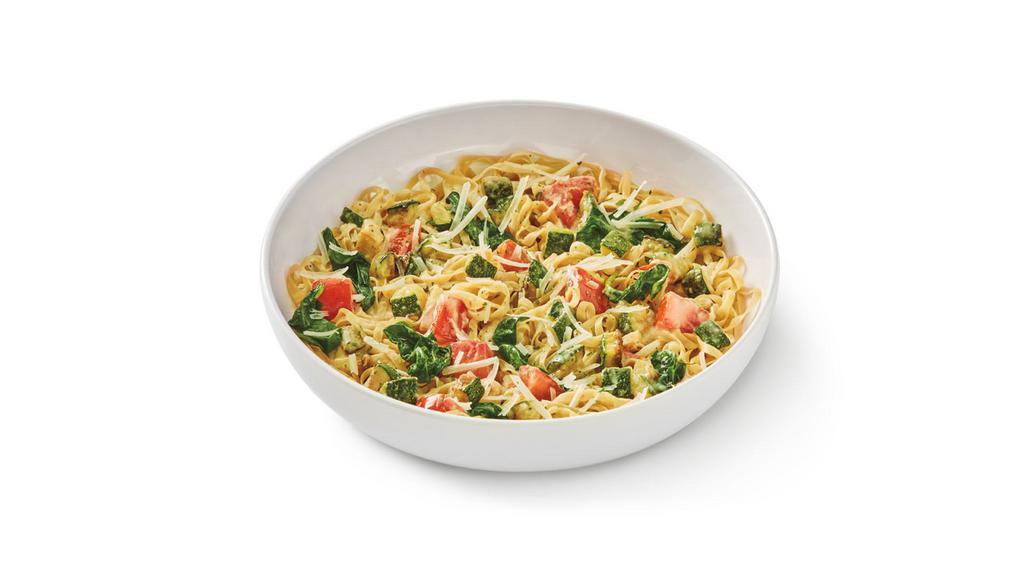 Leanguini Lemon Parm · 56% Lower Net Carbs* and 44% Higher Protein* - LEANguini noodles in a lemon parmesan sauce with roasted zucchini, Roma tomato and spinach topped with parmesan and parsley. . V.
