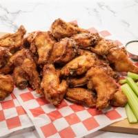 Jumbo Wings (40-Pc Football Pack) · 40 crisp fried golden-brown wings tossed in the sauce of your choice