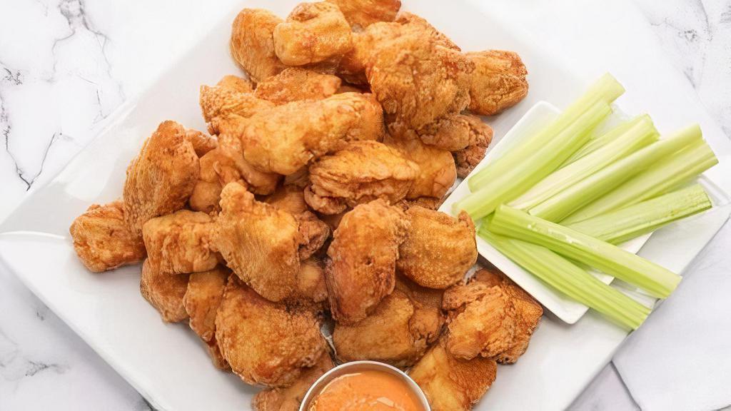 Boneless Wings (40-Pc Football Pack) · 40 boneless chicken wings tossed in your choice of sauce.