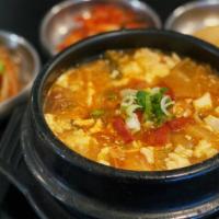 T15. Fish Cake Soft Tofu Soup · Organic Tofu boiled with fish cake and vegetables.