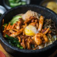 B1. Seafood Stoneware Bibimbab · Spicy. Rice, vegetables, egg, shrimp, squid, octopus with spicy sauce.