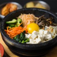 B5. Tofu & Vegetables Stoneware Bibimbab · Rice, organic tofu, egg, and vegetables.