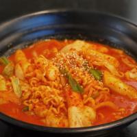 V6. Ramen Dukbokki · Spicy. Rice cake, ramen and vegetables with spicy sauce.