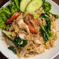 Khaosan Thai Fried Rice · Gluten-free. Fried jasmine rice, egg, tomato, Chinese broccoli, yellow and green onions. Add...