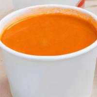 Tomato Soup · Vine-ripened tomato, touch of cream & basil