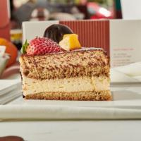 Tiramisu with SURPRISE DECORATION · -Mascapone cheese with layers of sponge cake, soaked in espresso and liqueurs Grand Marya, d...