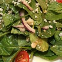 Baby Spinach · with gorgonzola cheese, red onions and honey balsamic dressing.