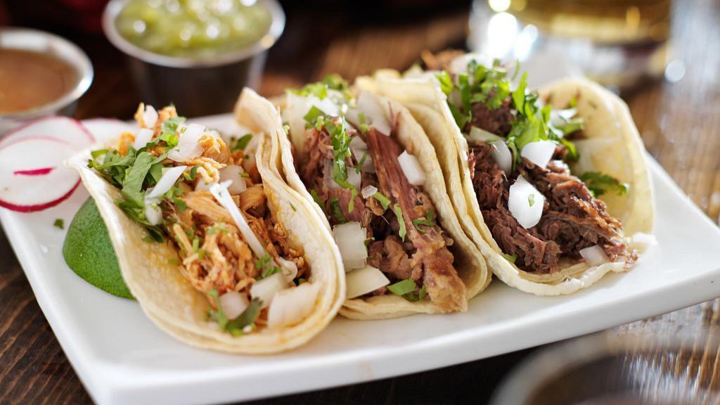 Al Pastor Taco (Grilled Pork) · Fresh grilled pork on tortilla, onions, reddish, cilantro, lemon and chef's salsa. Make it a super as well! Add rice, beans, sour cream and cheese.