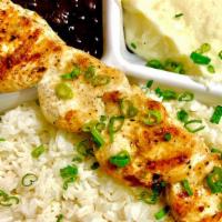 Chicken Breast · Skewer of Chicken Breast, comes with White Rice, Black Beans, Mashed Potatoes, Mixed Green S...