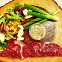 Raw Skewer of Beef · Raw Skewer of Beef to be Grilled at Home.  We send our Special Seasoning separated with it i...