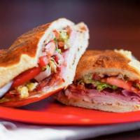 Club Carve · Smoked bacon, turkey and spiced ham with choice of provolone or Swiss. Includes mayo, Dijon ...
