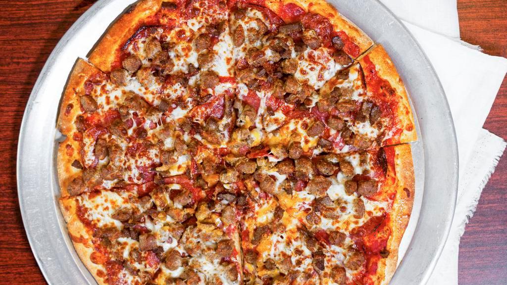 Everest · Our everest is topped with cheddar, italian sausage, meatball, mozzarella, pepperoni, salami, tomato sauce