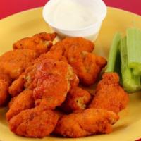 Spicy Buffalo Wings (5 lbs.) · Spicy buffalo sauce only. (choice of ranch or bleu cheese served with carrot sticks and cele...