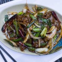 Mongolian Beef · White & green onions, hoisin pepper sauce, served on crispy rice noodles.