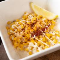 Esquite · Cup size. Mexican corn off the cob, in a spicy mayo and lime mix with queso Cotija. Cooked f...