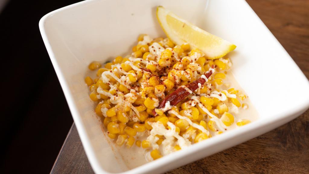 Esquite · Cup size. Mexican corn off the cob, in a spicy mayo and lime mix with queso Cotija. Cooked fresh to order.