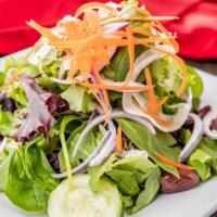 Vitale House Salad · Mixed organic green salad tossed in our Italian dressing vinaigrette