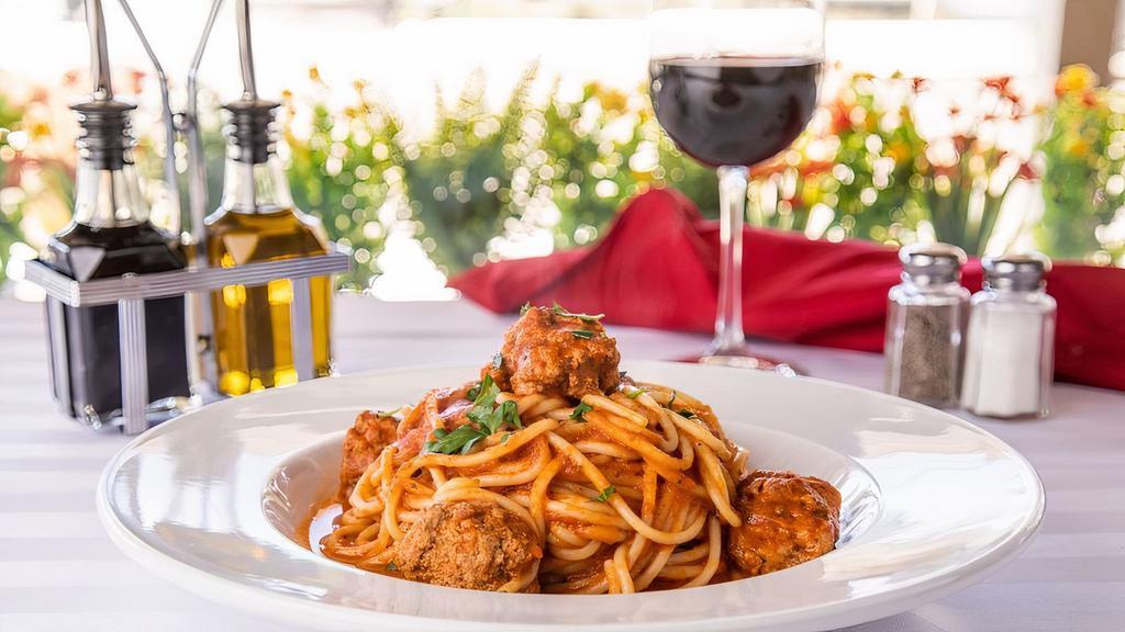 Spaghetti and Meatballs · Spaghetti topped with house made meatballs in our marinara sauce