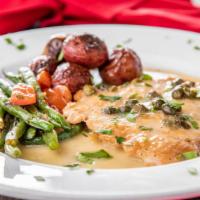 Chicken Picatta · Breast of chicken sautéed with lemon, capers, and white wine