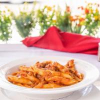 Kids Penne Pasta Alla Bolognese · Pasta sautéed with house made meat sauce (top sirloin)