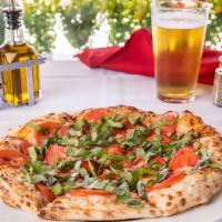 Margherita Pizza Regular · House made pizza sauce, mozzarella cheese, roma tomato, and fresh basil (10